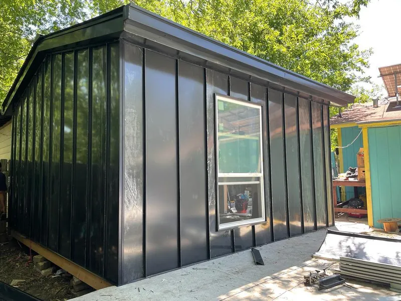 Black standing seam metal wall panels for Roof Inspection in Chino Hills